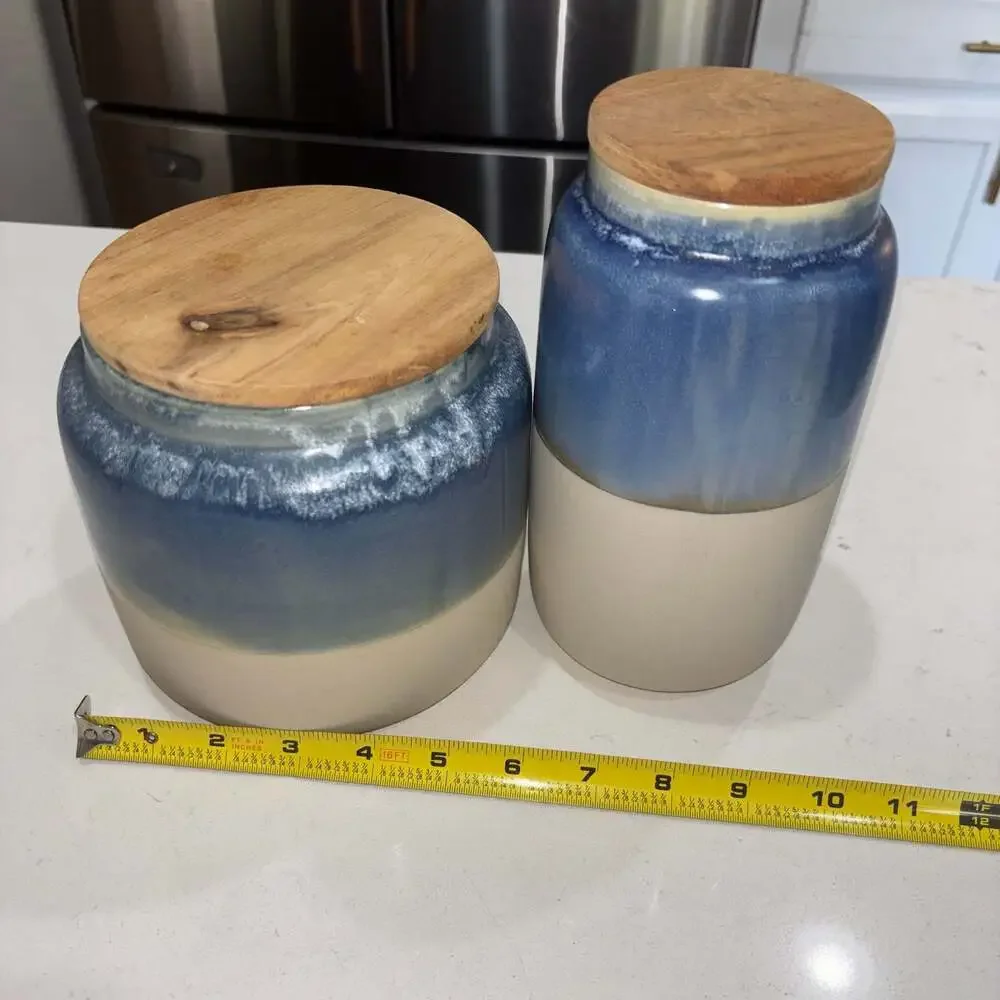 Set of 2 World Market Blue and Cream Ceramic Canisters Wooden Lids